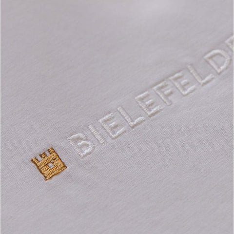 Bielefelder T-Shirt Weiß mit Backprint „Großstadt Dschungel“